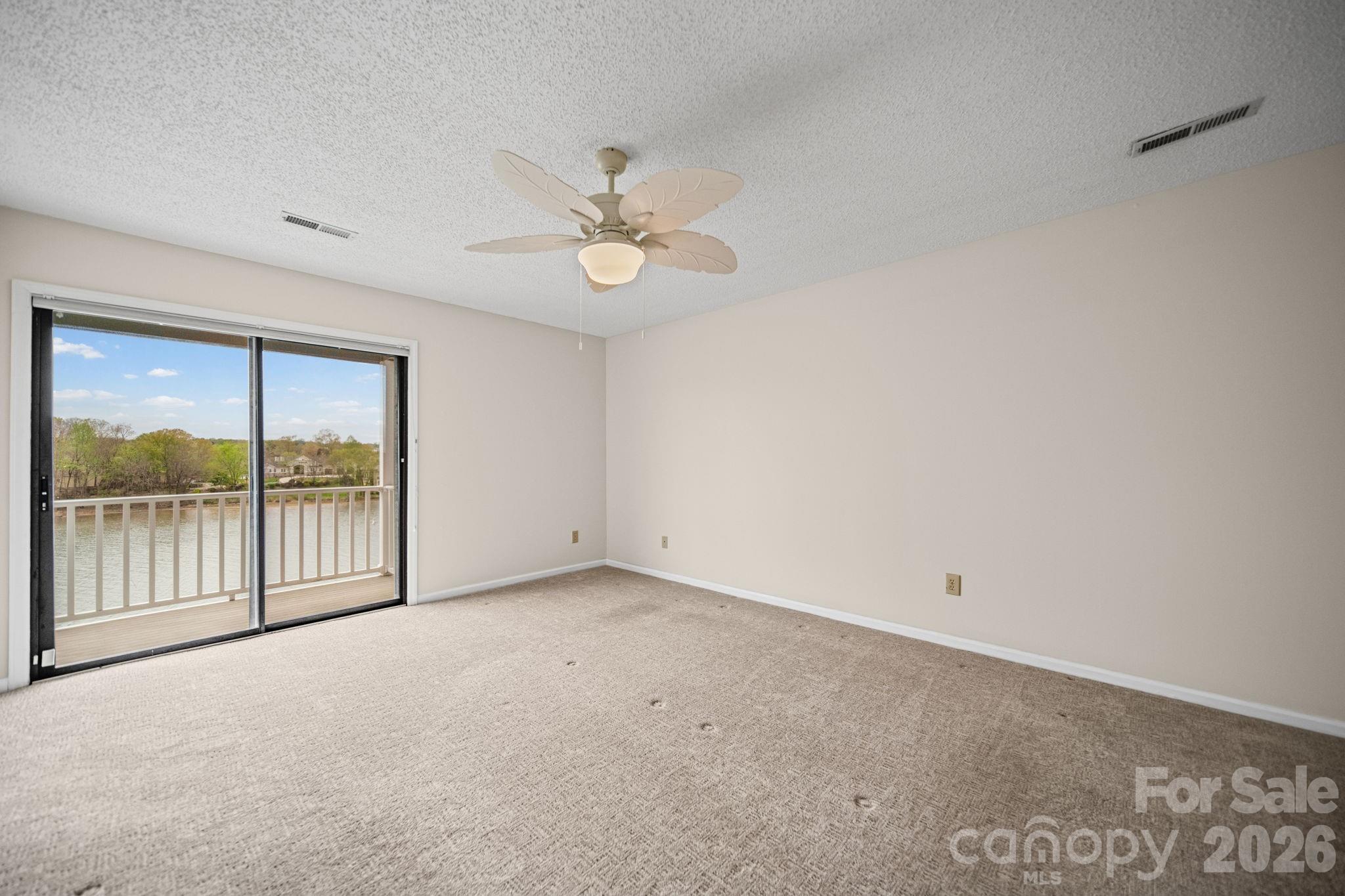 529 Catspaw Road Statesville, NC 28677 - Photo 20 of 48 a view of an empty room with a window