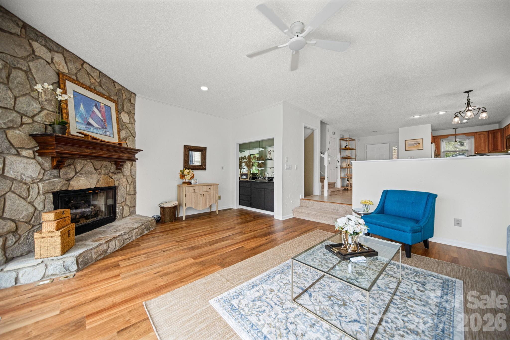 529 Catspaw Road Statesville, NC 28677 - Photo 9 of 48 a living room with furniture and a fireplace
