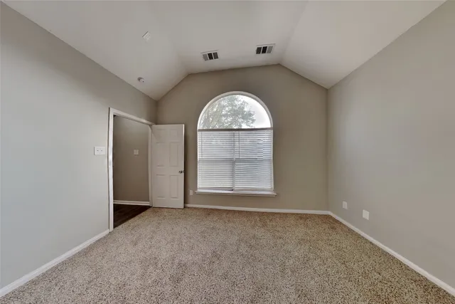 an empty room that has a window