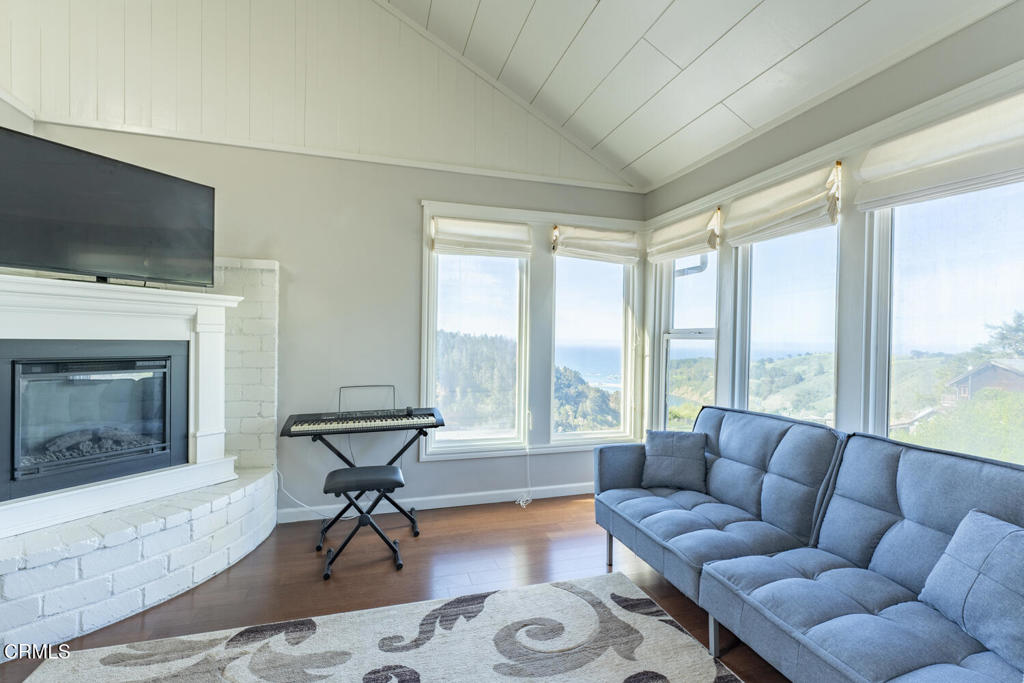32751 Navarro Ridge Road Albion, CA 95410 - Photo 43 of 57 a living room with furniture and a flat screen tv