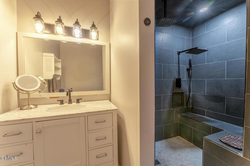 32751 Navarro Ridge Road Albion, CA 95410 - Photo 44 of 57 a bathroom with a double vanity sink mirror and shower