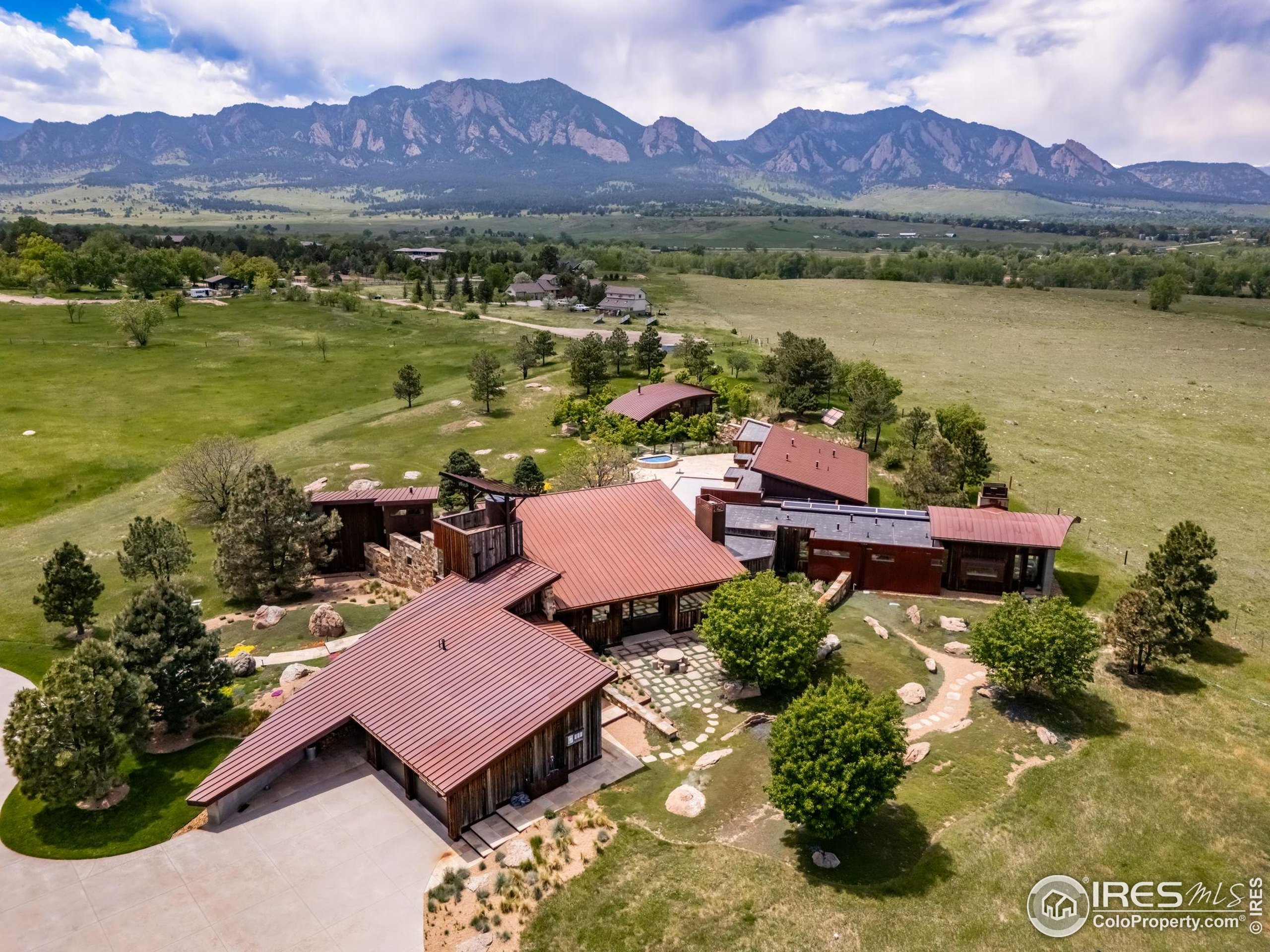 an aerial view of a house with garden