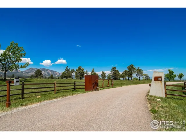 a view of a swimming pool with a lake view