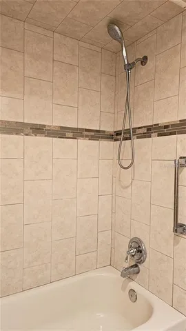 a bathroom with a sink and a shower