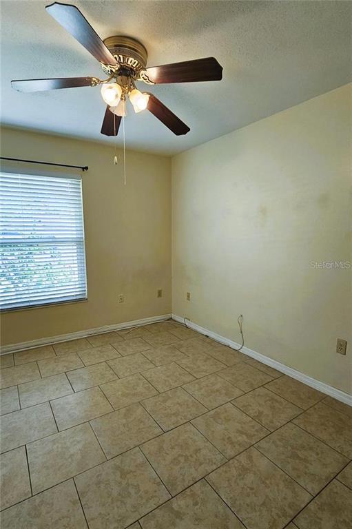 4330 Tahitian Gardens Circle, Unit C Holiday, FL 34691 - Photo 14 of 20 a view of an empty room