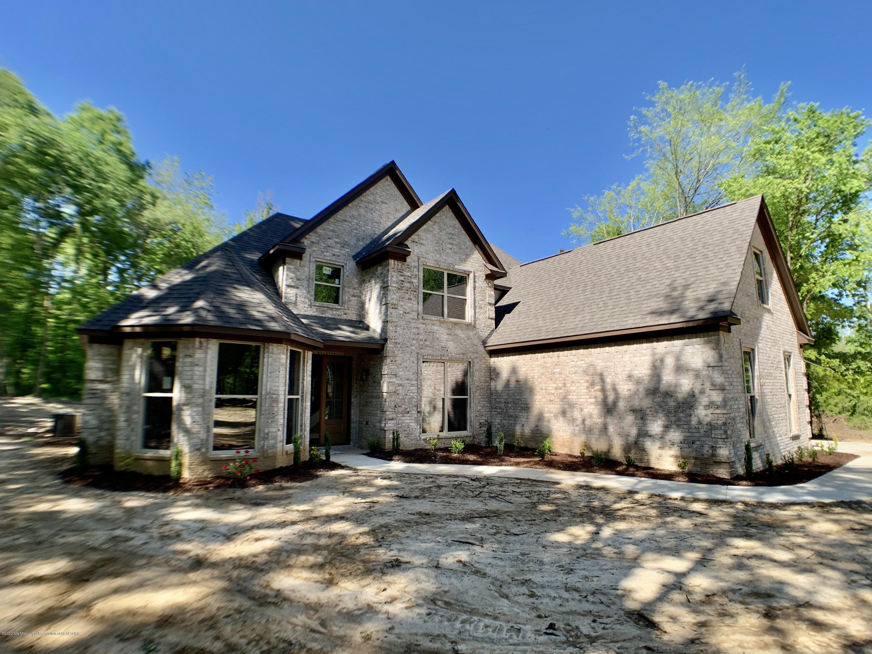 10794 Woolsey Road Olive Branch, MS 38654 - Photo 2 of 27 228EA0AB-A5CA-4BE3-88AB-C30F30E2F765