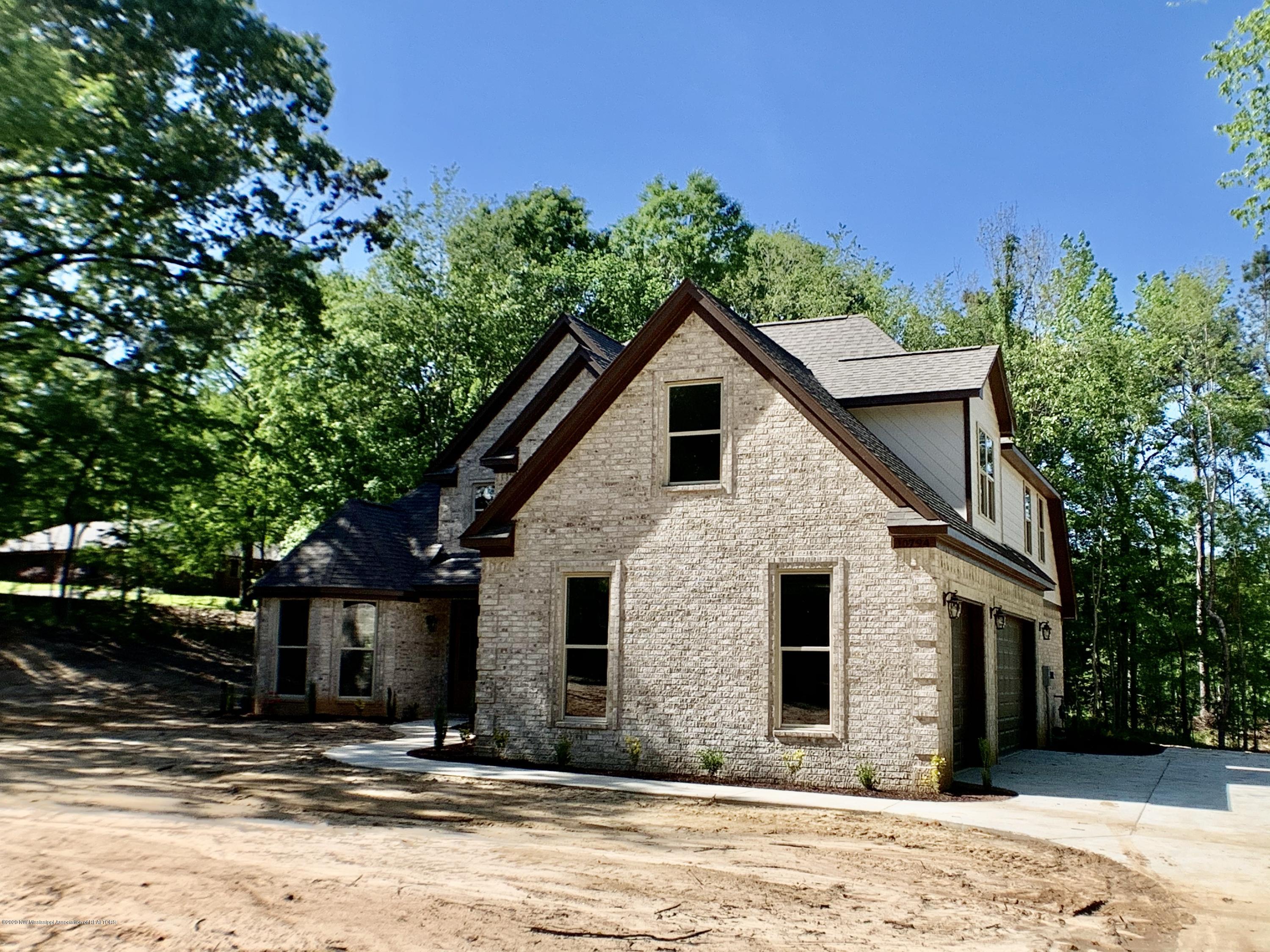 10794 Woolsey Road Olive Branch, MS 38654 - Photo 3 of 27 AD34CB38-D046-4D3F-9419-445A663FA909