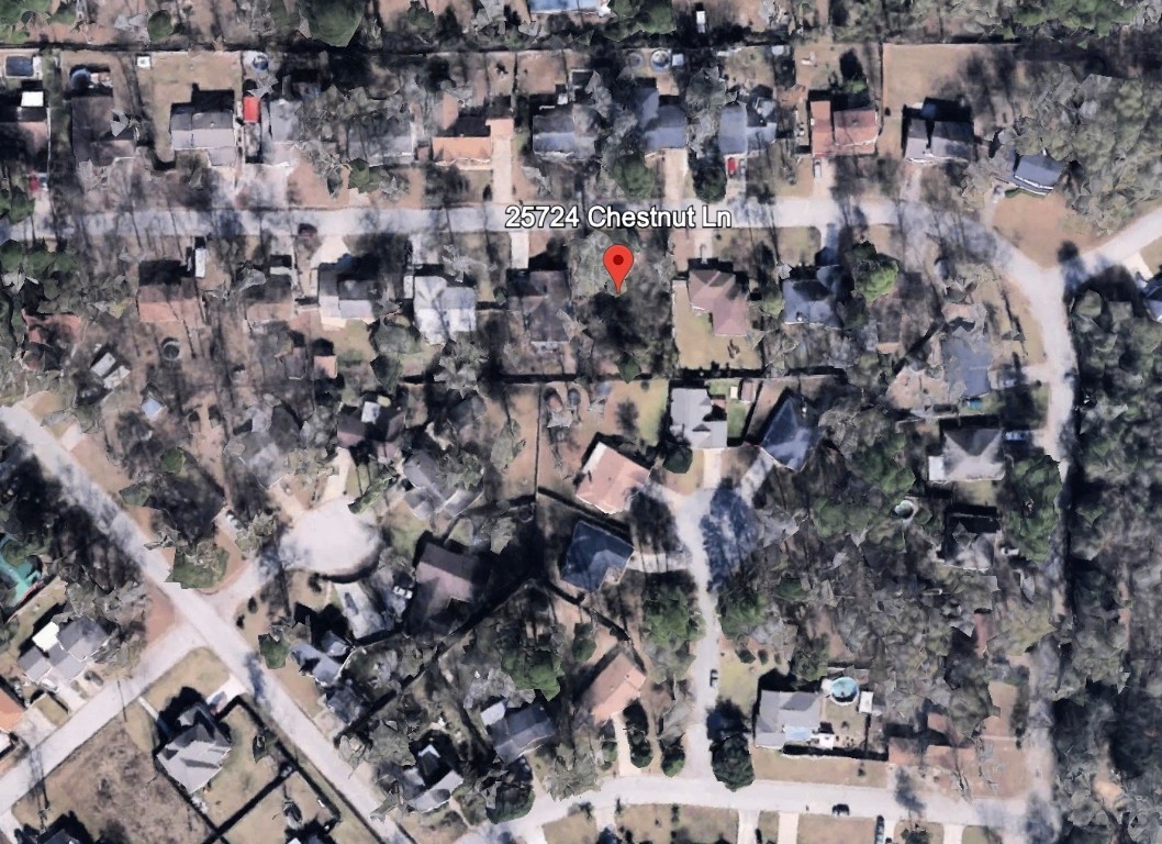 25724 Chestnut Lane Splendora, TX 77372 - Photo 5 of 5 an aerial view of a city