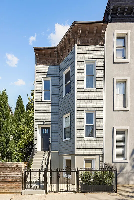 9 Kane Place Brooklyn, NY 11233 - Photo 17 of 18 a view of a house with a window