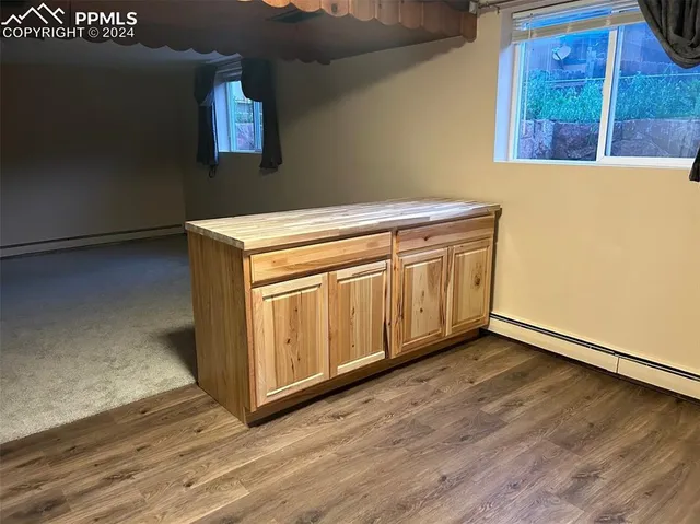 a view of a room with rack on the wall