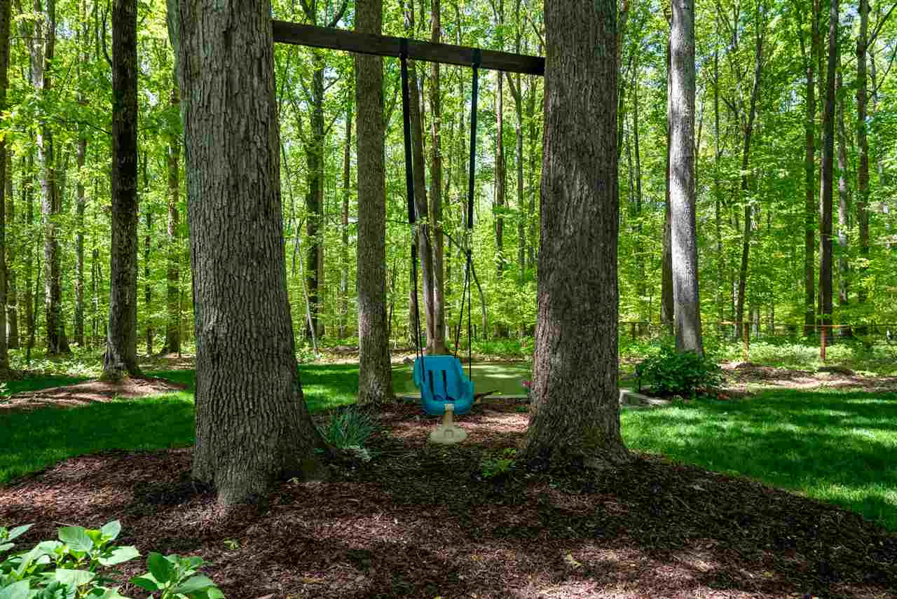 9421 Barton Creek Road Raleigh, NC 27615 - Photo 27 of 30 Tree Swing in Backyard