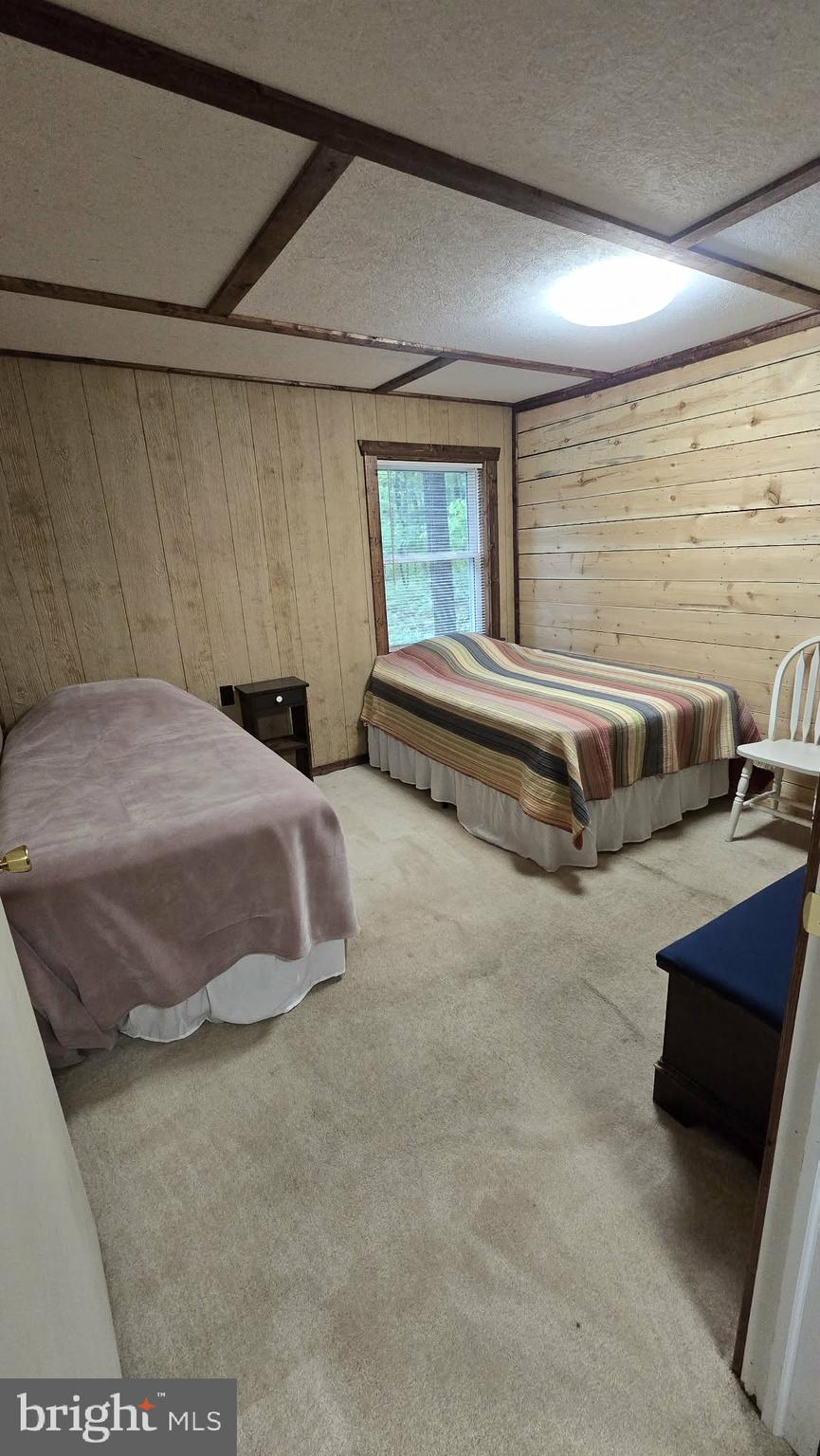 8245 Aughwick Road Fort Loudon, PA 17224 - Photo 18 of 26 a spacious bedroom with a bed and a window