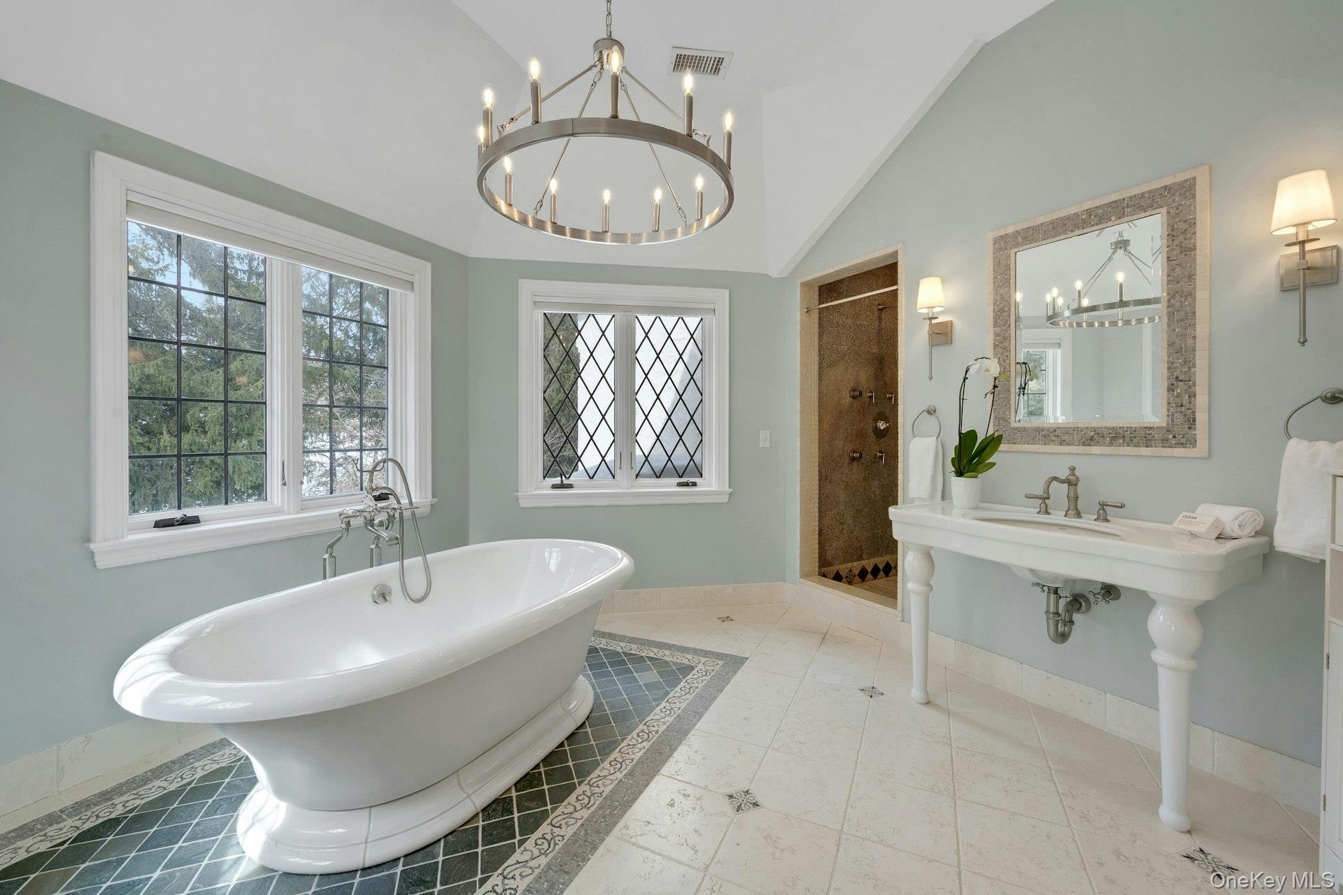 15 Carstensen Road Scarsdale, NY 10583 - Photo 15 of 35 a spacious bathroom with a sink and a mirror