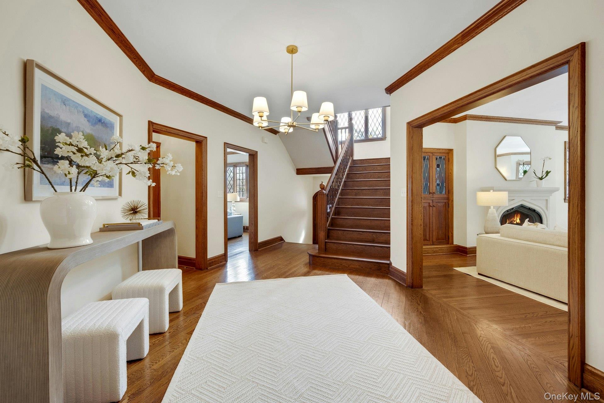 15 Carstensen Road Scarsdale, NY 10583 - Photo 2 of 35 a view of a livingroom with furniture and staircase