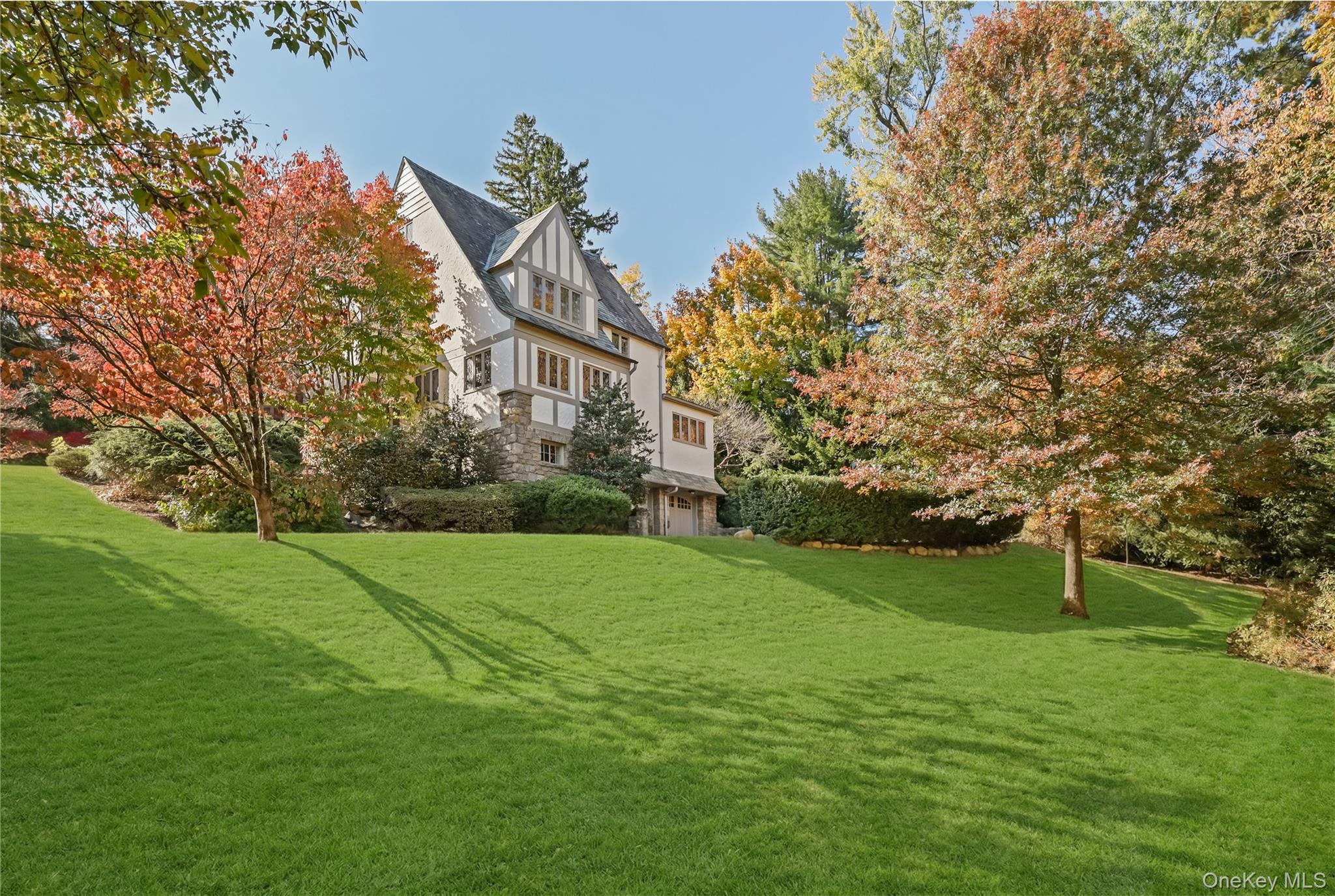 15 Carstensen Road Scarsdale, NY 10583 - Photo 26 of 35 a view of an house with backyard