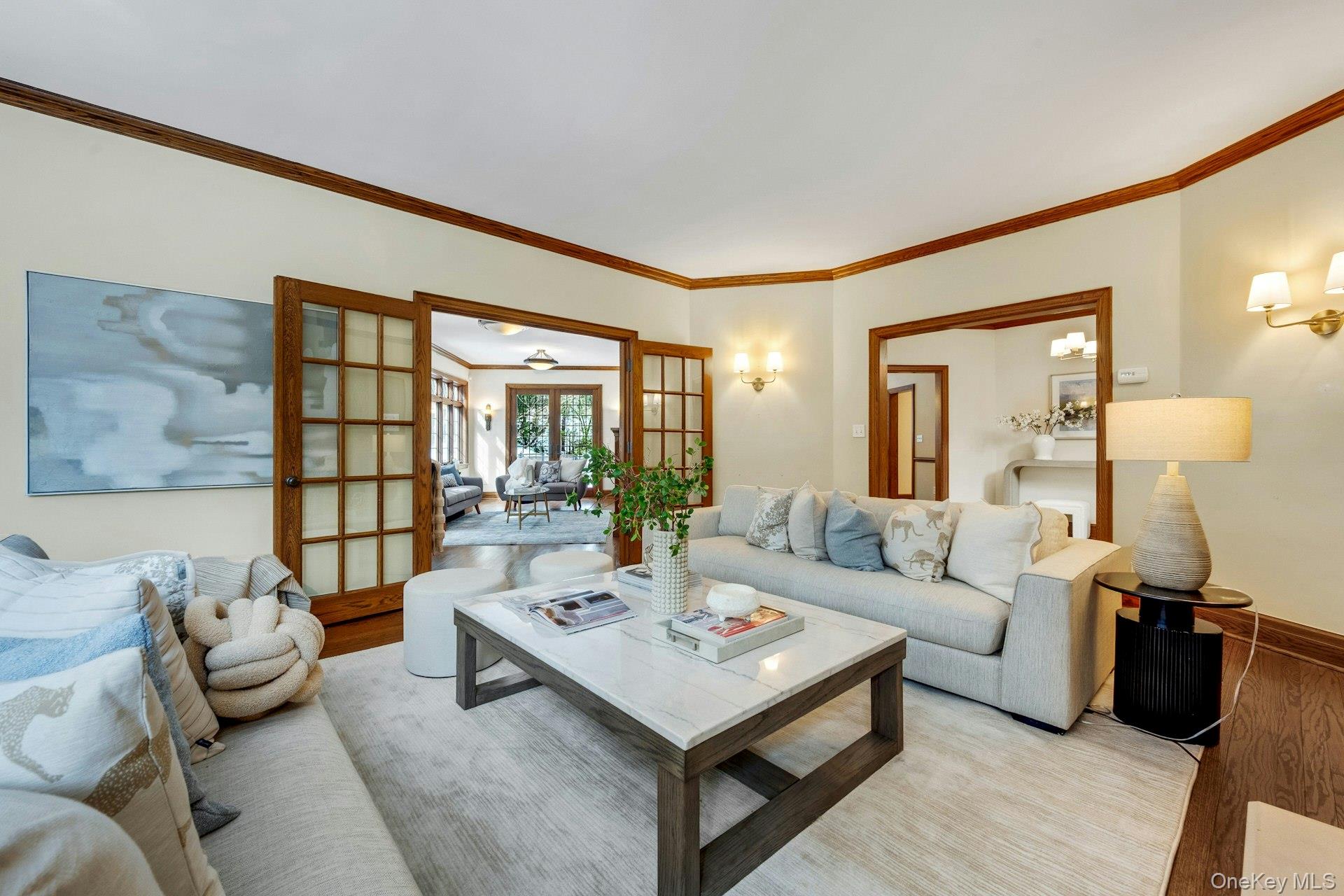 15 Carstensen Road Scarsdale, NY 10583 - Photo 4 of 35 a living room with furniture and a table