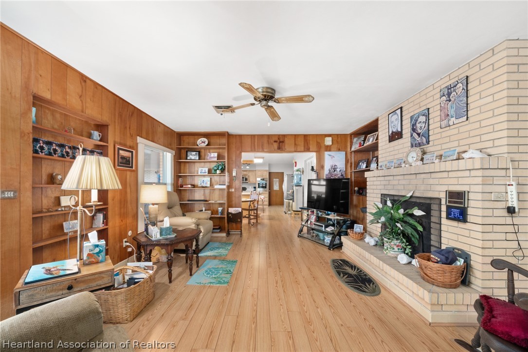 325 Sunset Road Frostproof, FL 33843 - Photo 20 of 48 a living room with furniture and a fireplace
