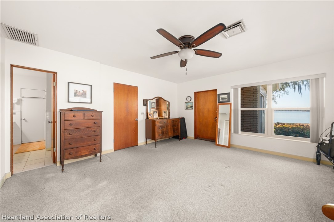 325 Sunset Road Frostproof, FL 33843 - Photo 25 of 48 a view of a livingroom with an empty space