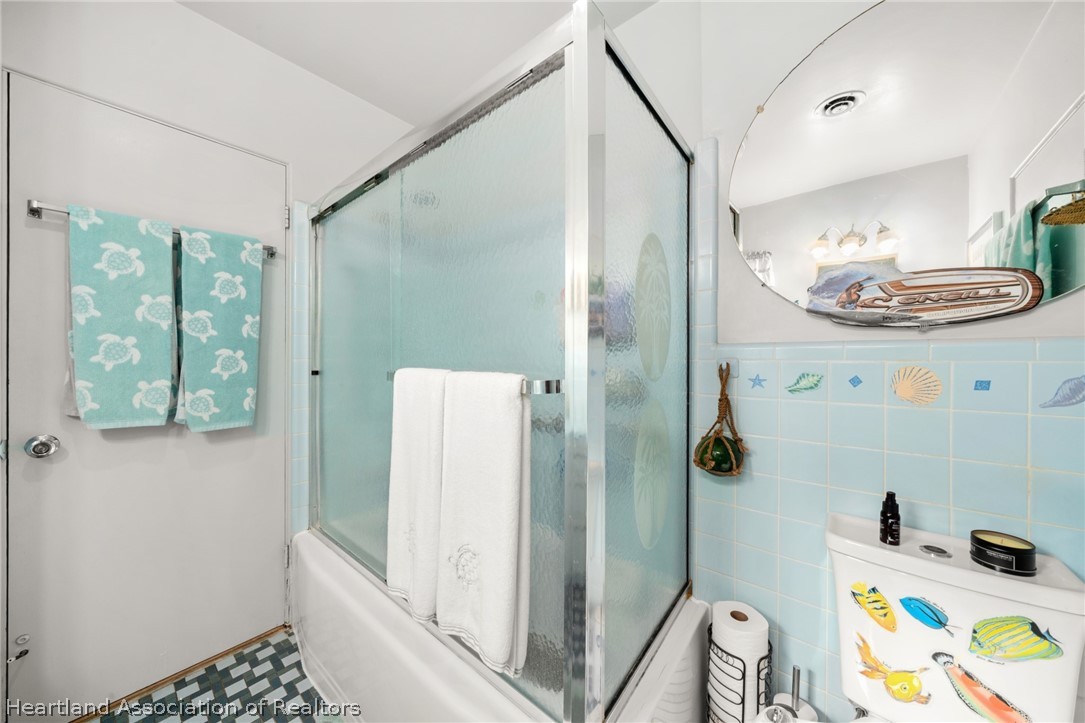 325 Sunset Road Frostproof, FL 33843 - Photo 36 of 48 a bathroom with a sink and a mirror