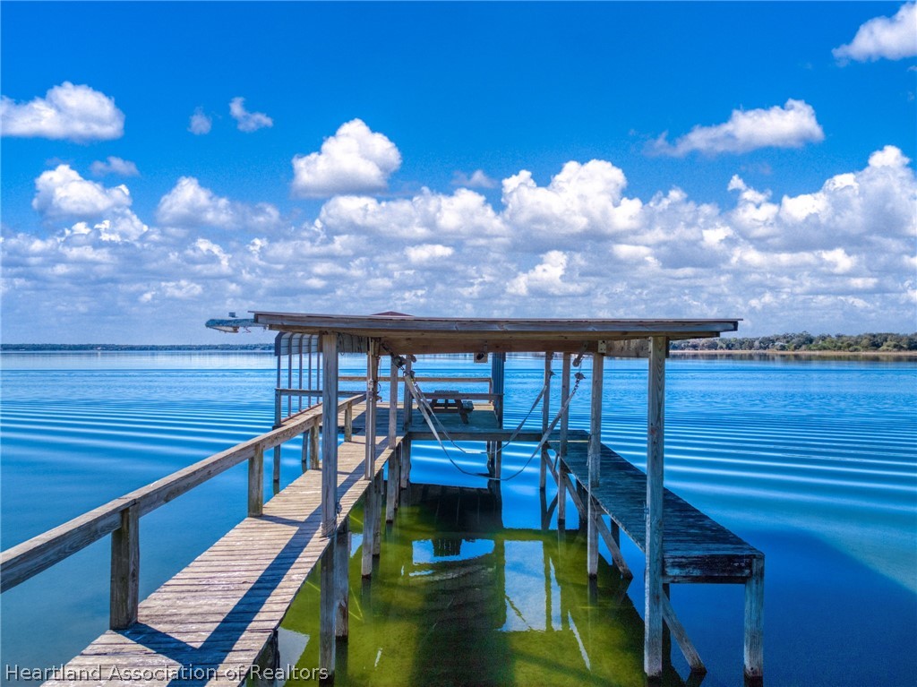 325 Sunset Road Frostproof, FL 33843 - Photo 46 of 48 a view of a balcony with an ocean view