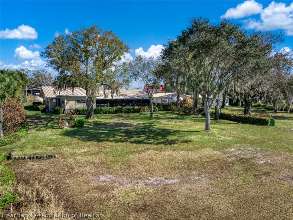 325 Sunset Road Frostproof, FL 33843 - Photo 6 of 48 a view of a park with large trees