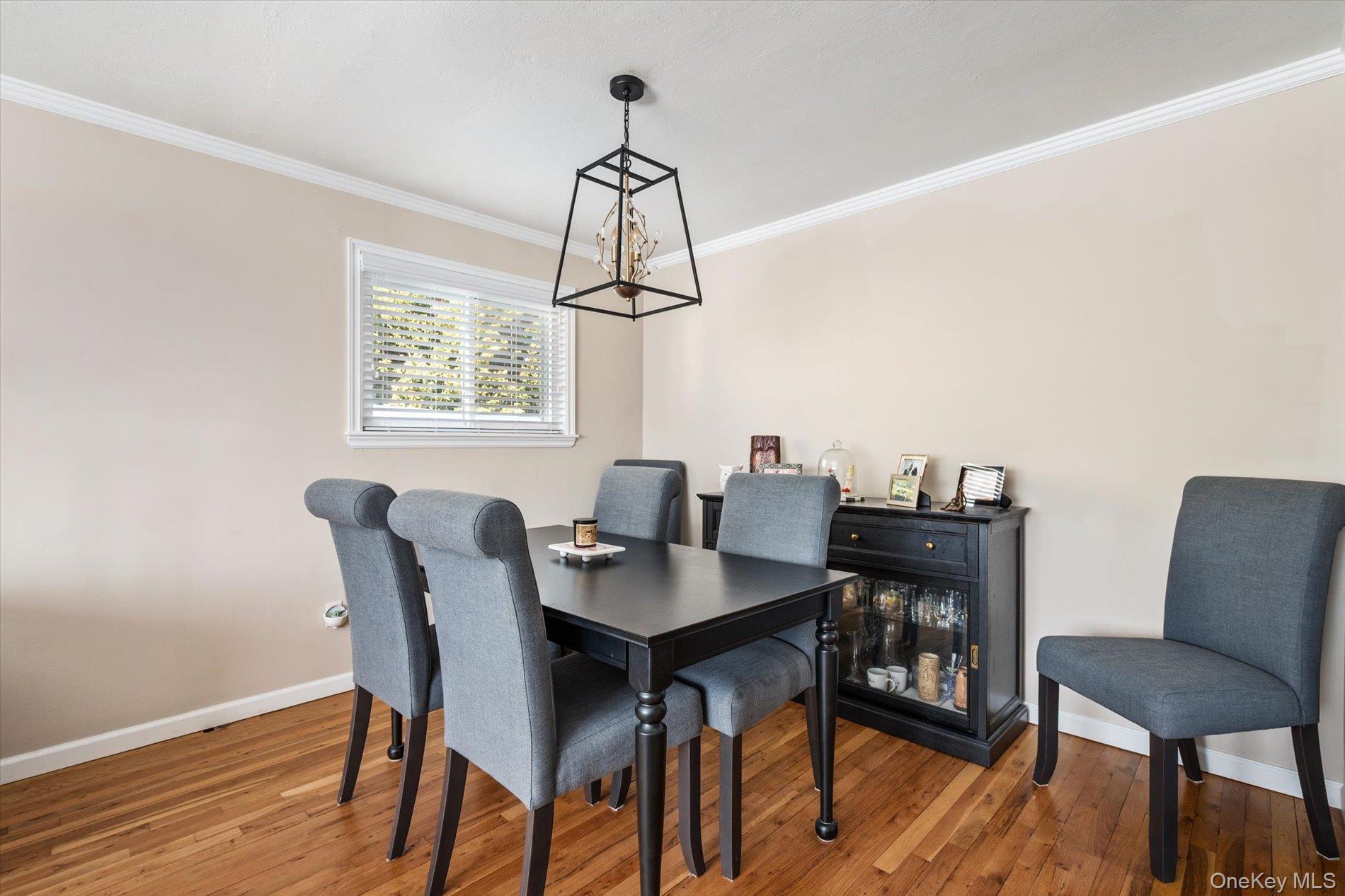 249 Hampton Road West Babylon, NY 11704 - Photo 8 of 22 a view of a dining room with furniture and wooden floor