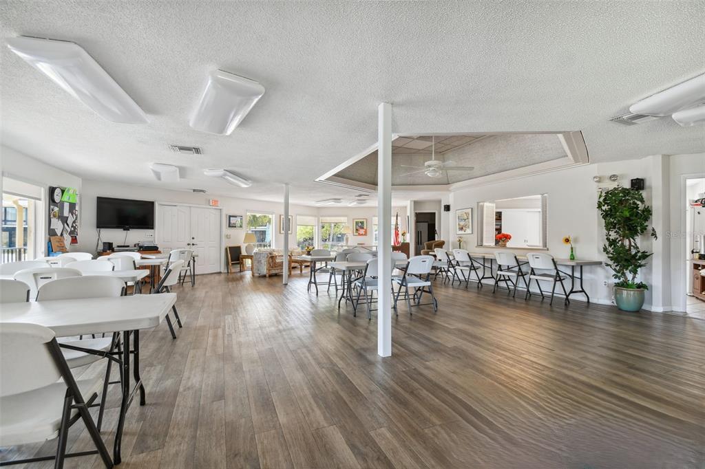 12300 Vonn Road, Unit 3102 Largo, FL 33774 - Photo 18 of 22 a living room with furniture and wooden floor