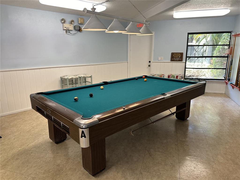 12300 Vonn Road, Unit 3102 Largo, FL 33774 - Photo 20 of 22 a room with pool table and windows