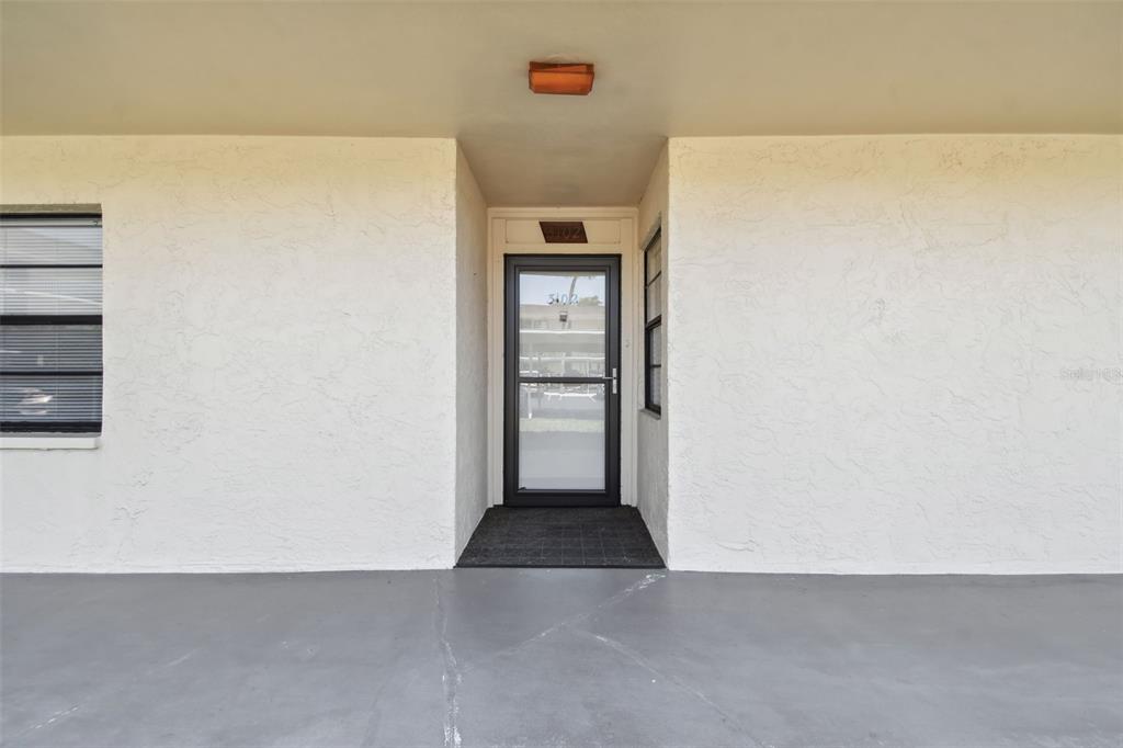 12300 Vonn Road, Unit 3102 Largo, FL 33774 - Photo 2 of 22 a view of a hallway