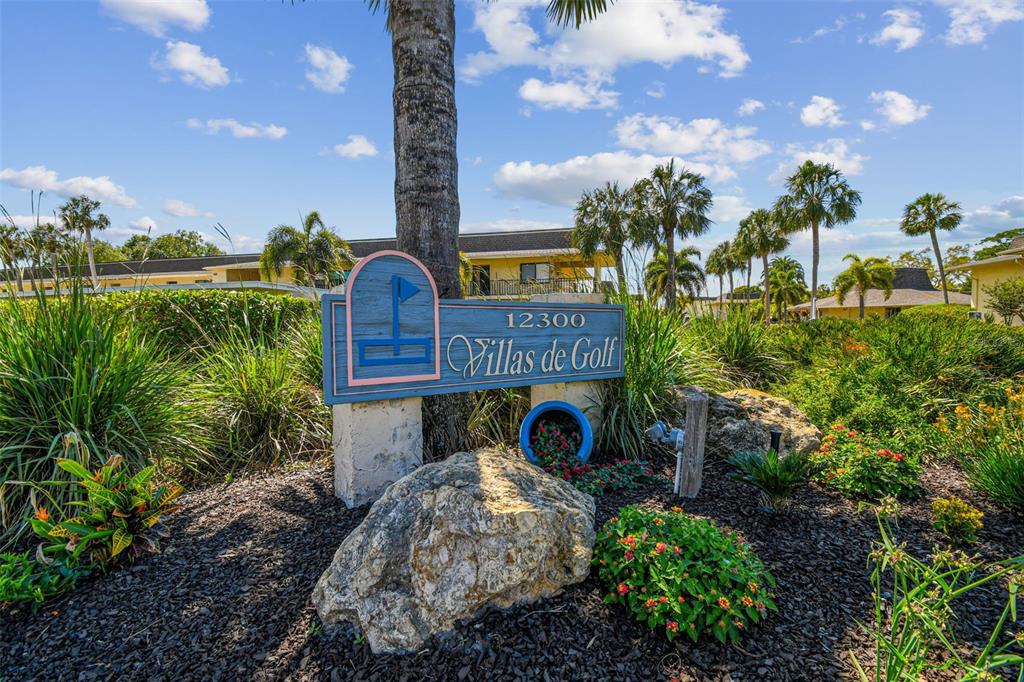 12300 Vonn Road, Unit 3102 Largo, FL 33774 - Photo 22 of 22 a front view of a house with garden