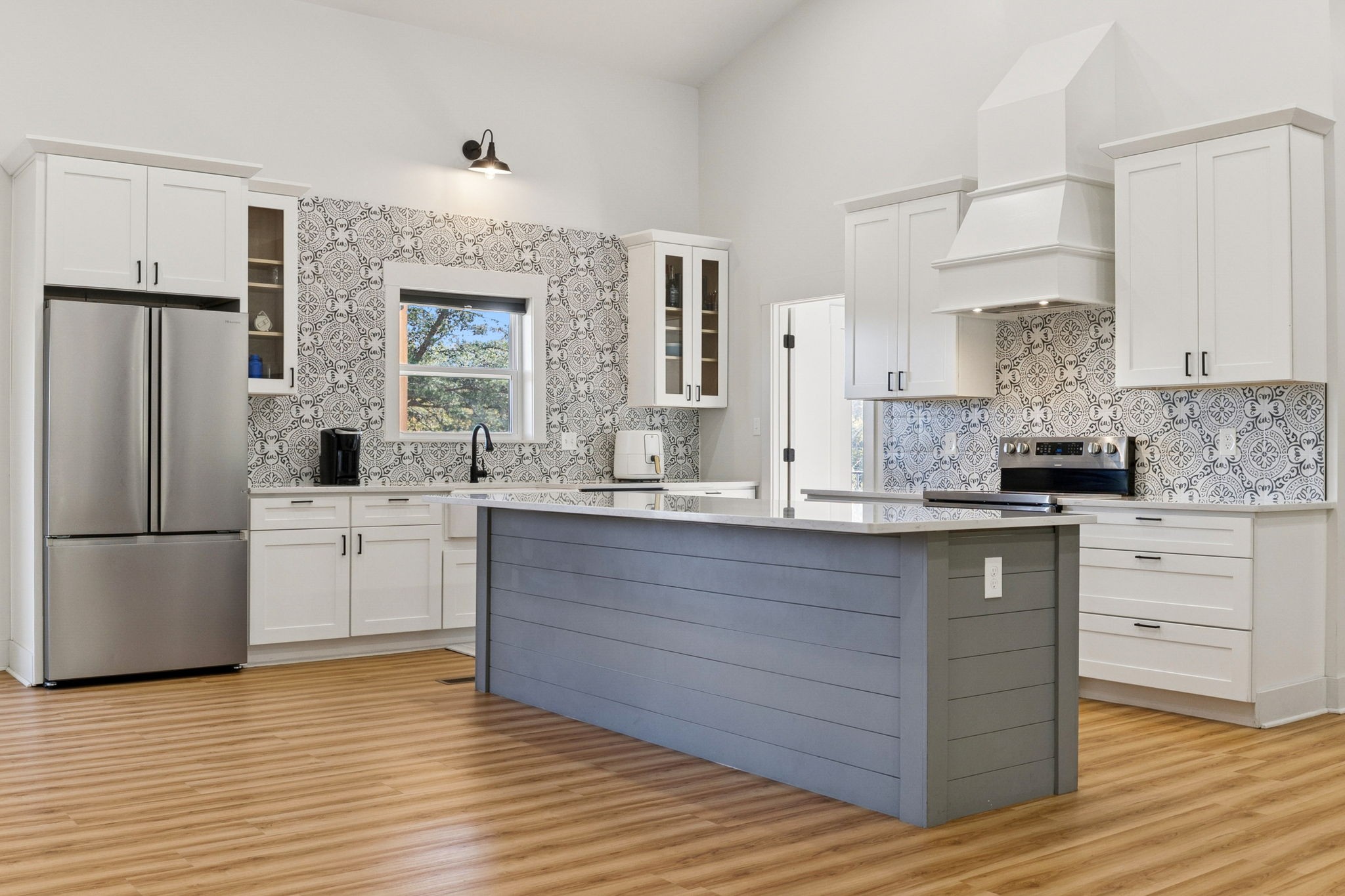 6060 Washer Road Lyles, TN 37098 - Photo 12 of 43 a kitchen with stainless steel appliances a refrigerator sink and cabinets