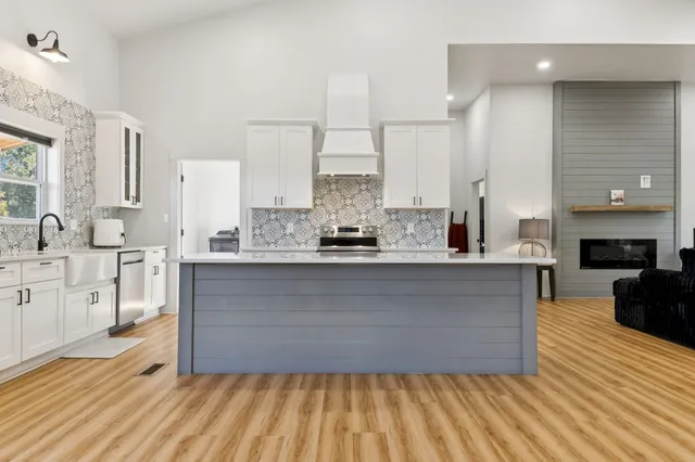 a large kitchen with cabinets
