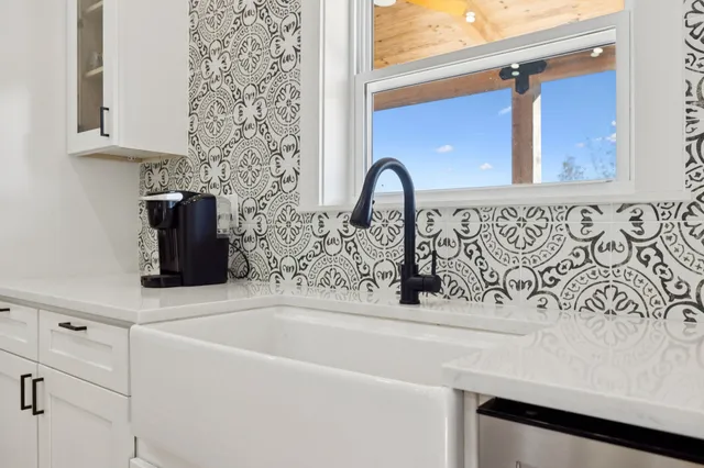 a bathroom with a bathtub and shower