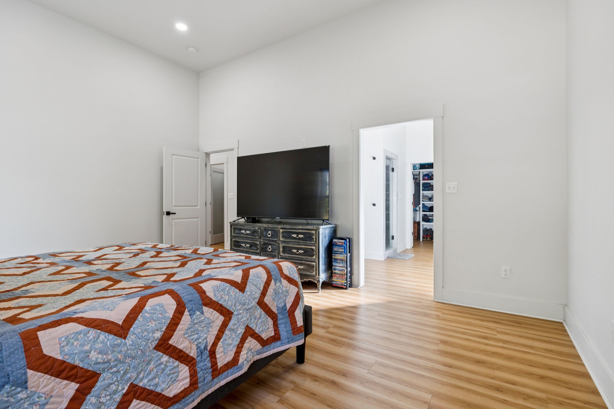 6060 Washer Road Lyles, TN 37098 - Photo 18 of 43 a bedroom with a bed and a flat screen tv