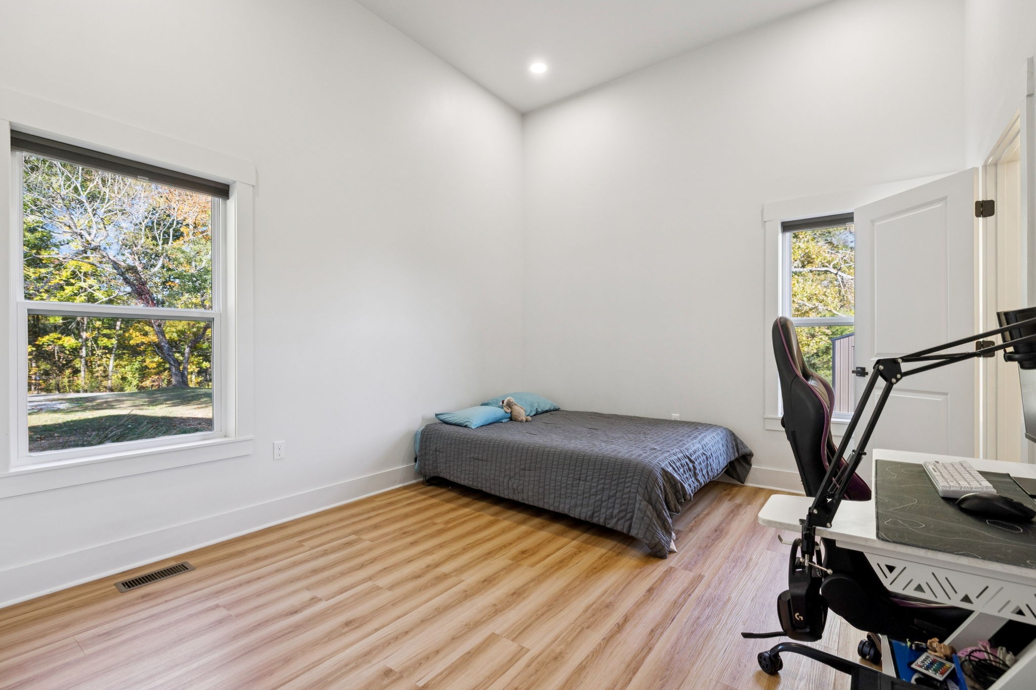 6060 Washer Road Lyles, TN 37098 - Photo 26 of 43 a bedroom with a bed and a window