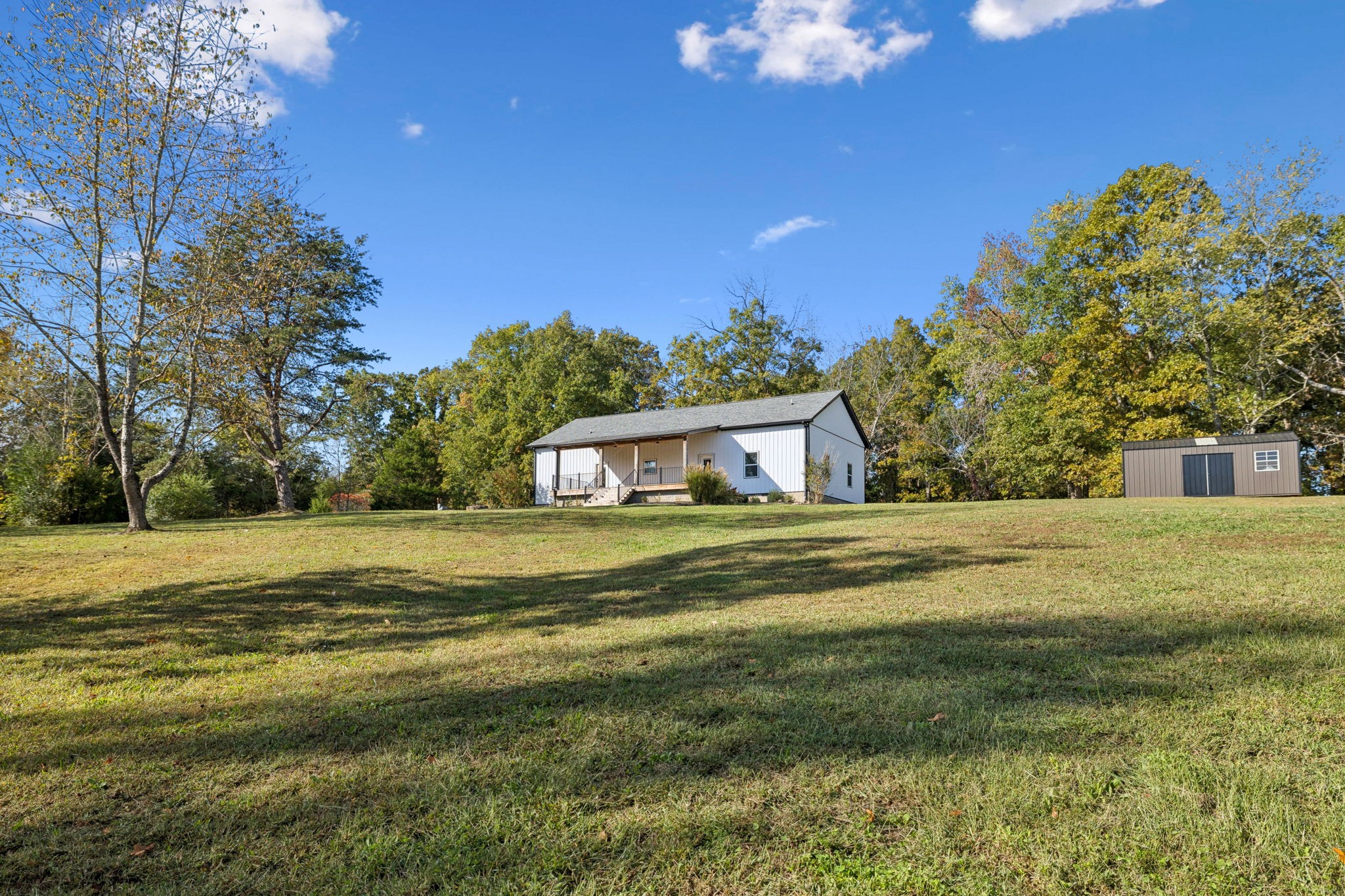6060 Washer Road Lyles, TN 37098 - Photo 30 of 43 a view of a house with a yard