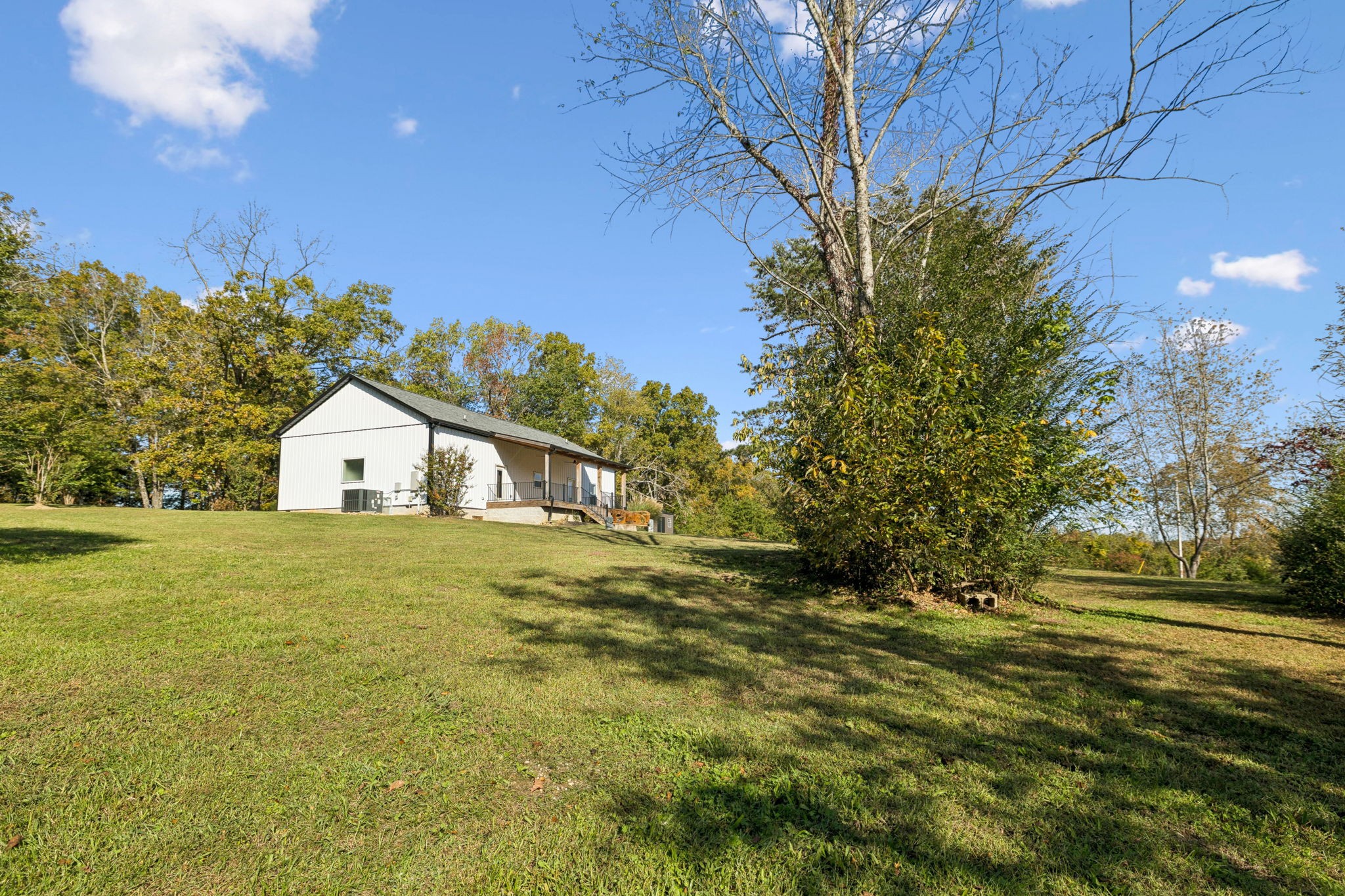 6060 Washer Road Lyles, TN 37098 - Photo 33 of 43 a front view of a house with a yard