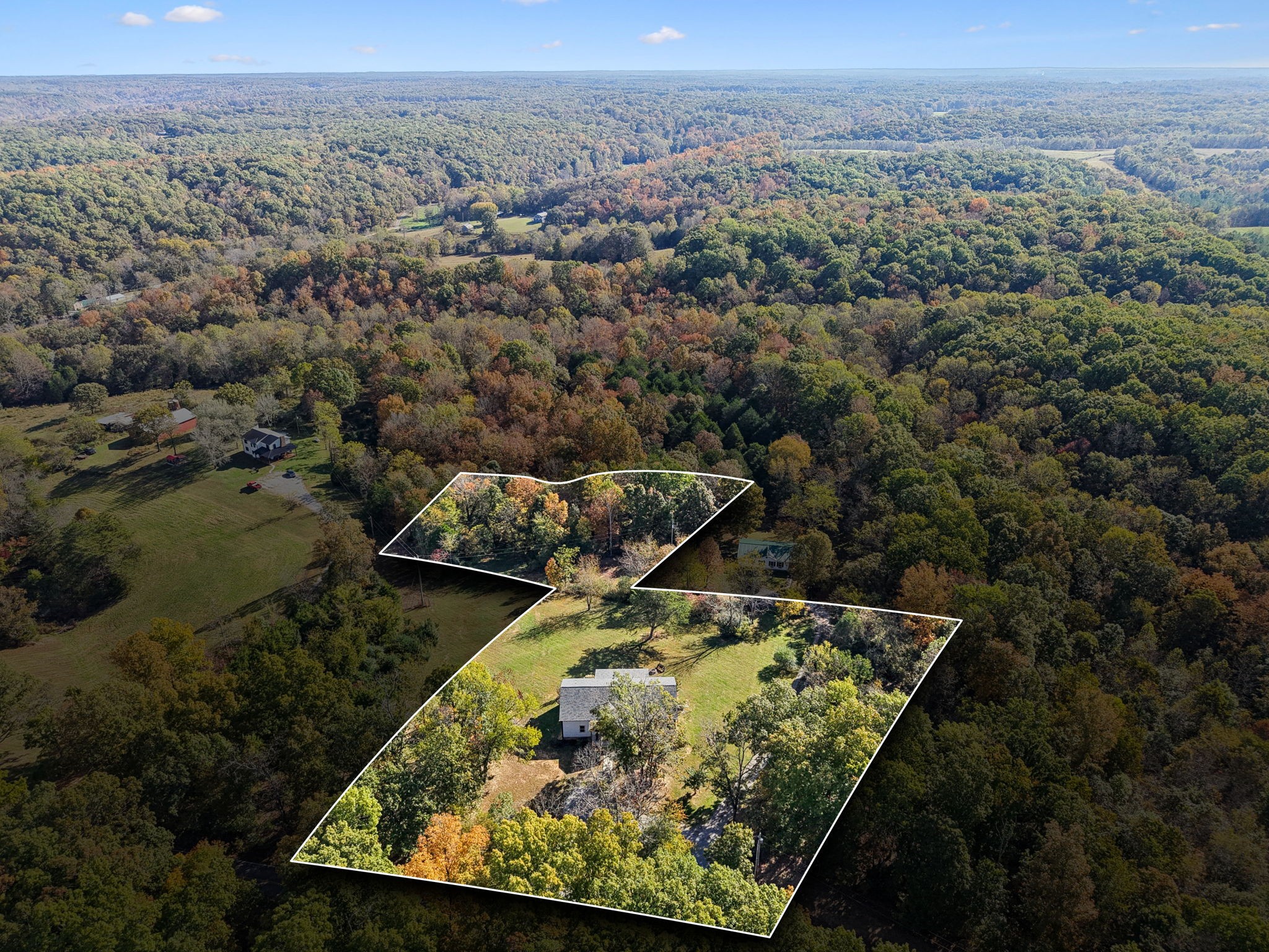 6060 Washer Road Lyles, TN 37098 - Photo 36 of 43 an aerial view of a house with a yard