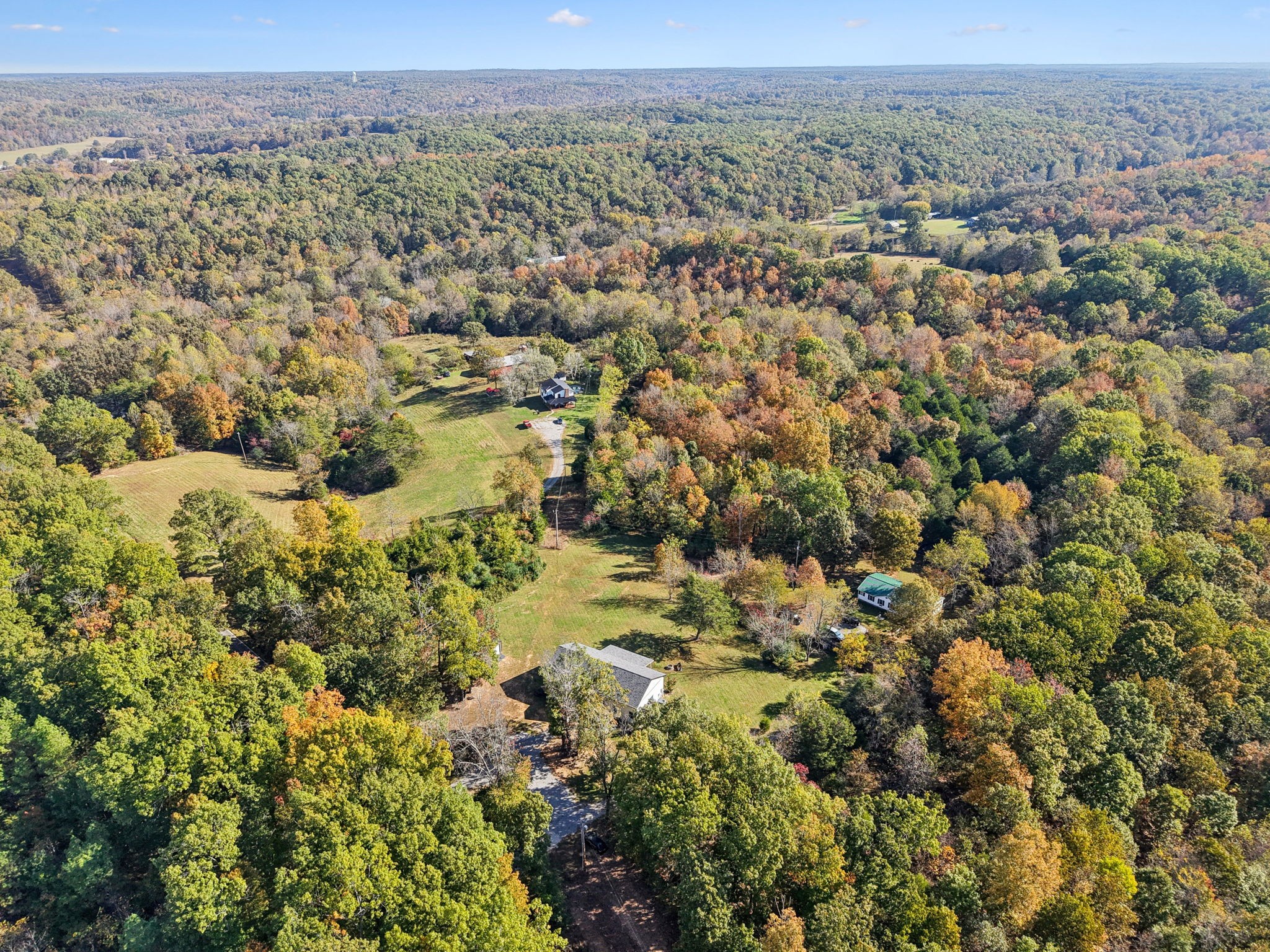 6060 Washer Road Lyles, TN 37098 - Photo 37 of 43 an aerial view of a houses with a yard