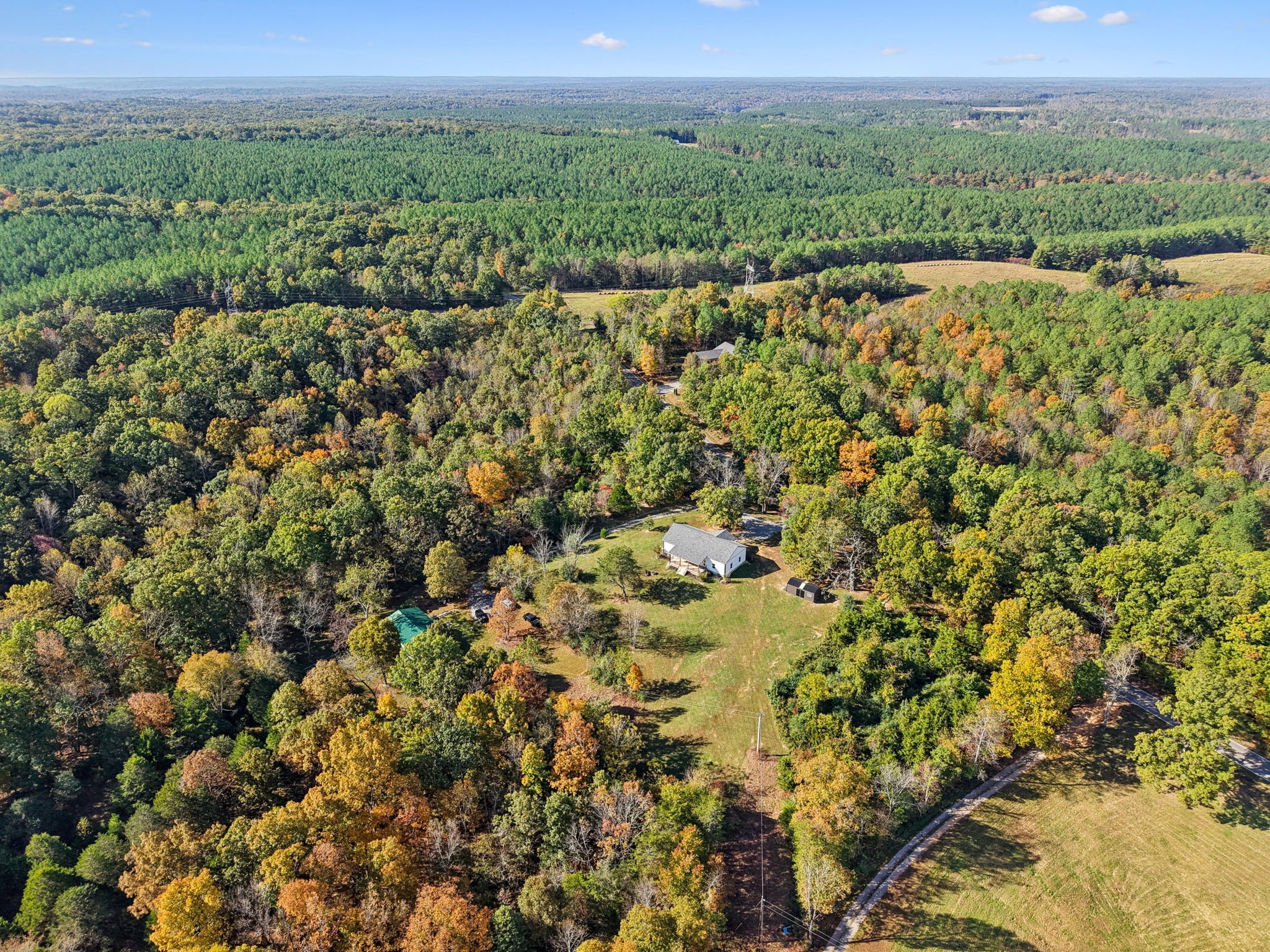 6060 Washer Road Lyles, TN 37098 - Photo 39 of 43 a view of a city with lush green forest