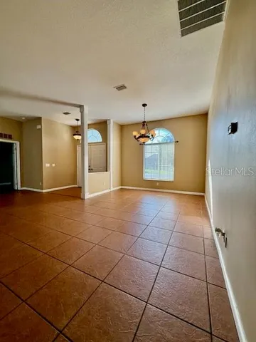 a view of a livingroom with a staircase