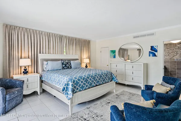 a view of a palm and trees with swimming pool