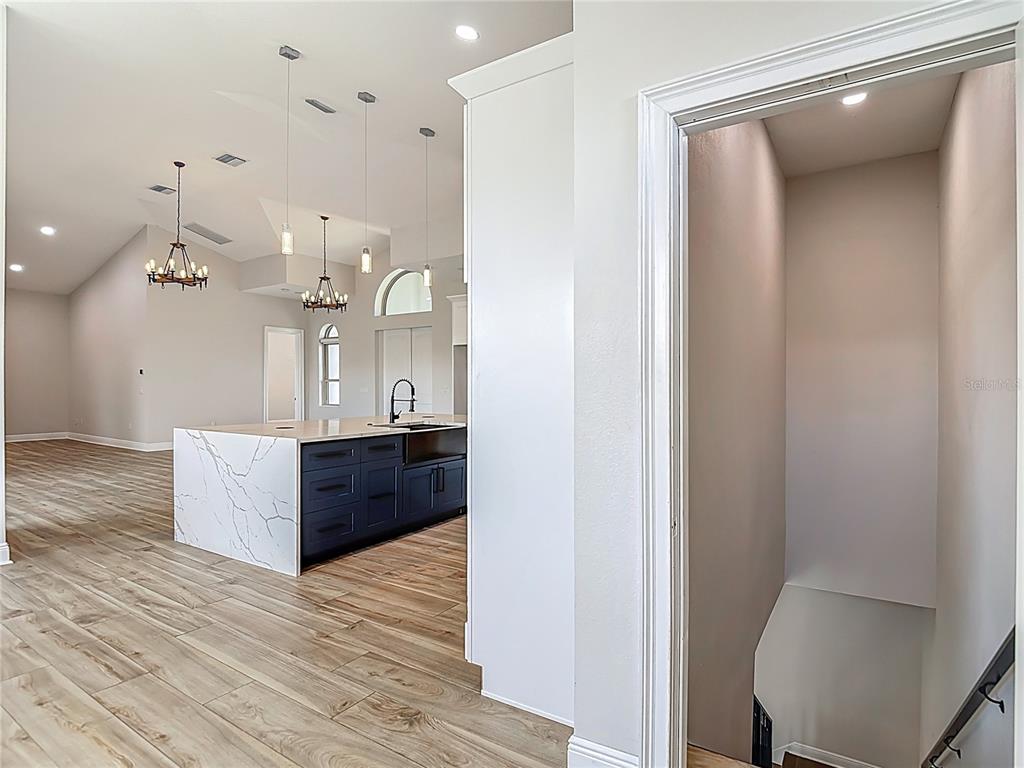 1329 Jumana Loop Apollo Beach, FL 33572 - Photo 12 of 40 a large bathroom with a glass door shower sink and a mirror