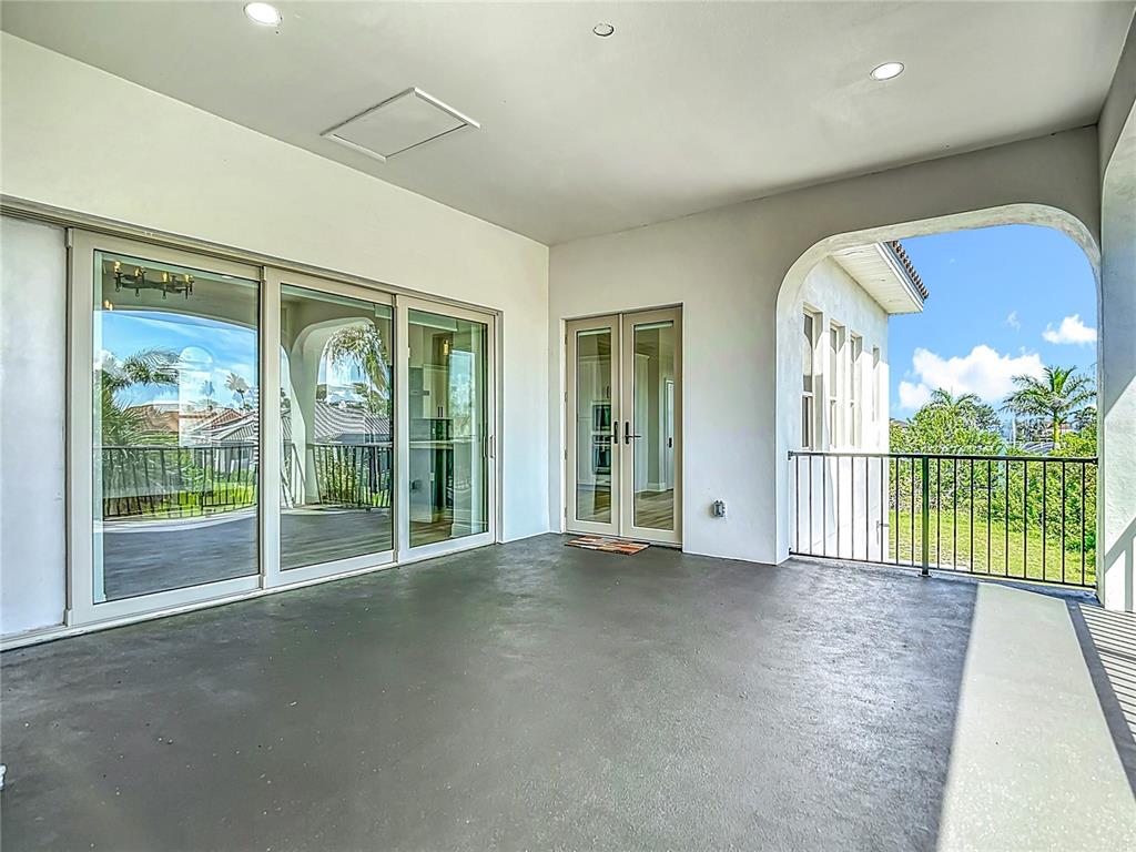 1329 Jumana Loop Apollo Beach, FL 33572 - Photo 15 of 40 a view of a room with balcony and ocean view