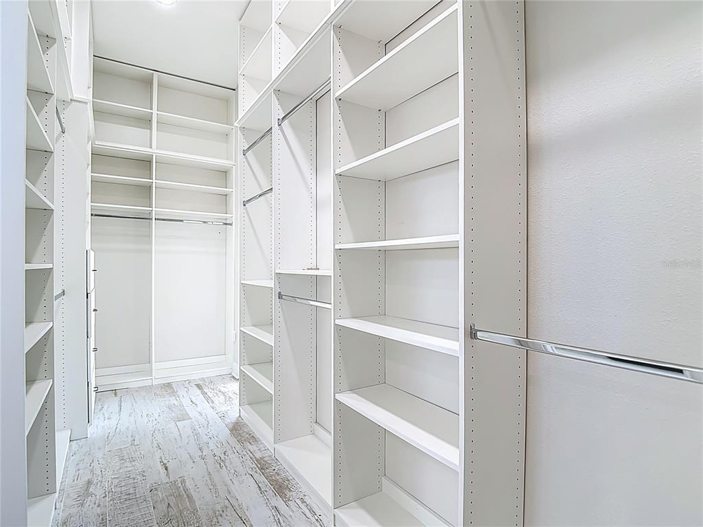 1329 Jumana Loop Apollo Beach, FL 33572 - Photo 26 of 40 a view of walk in closet with empty racks
