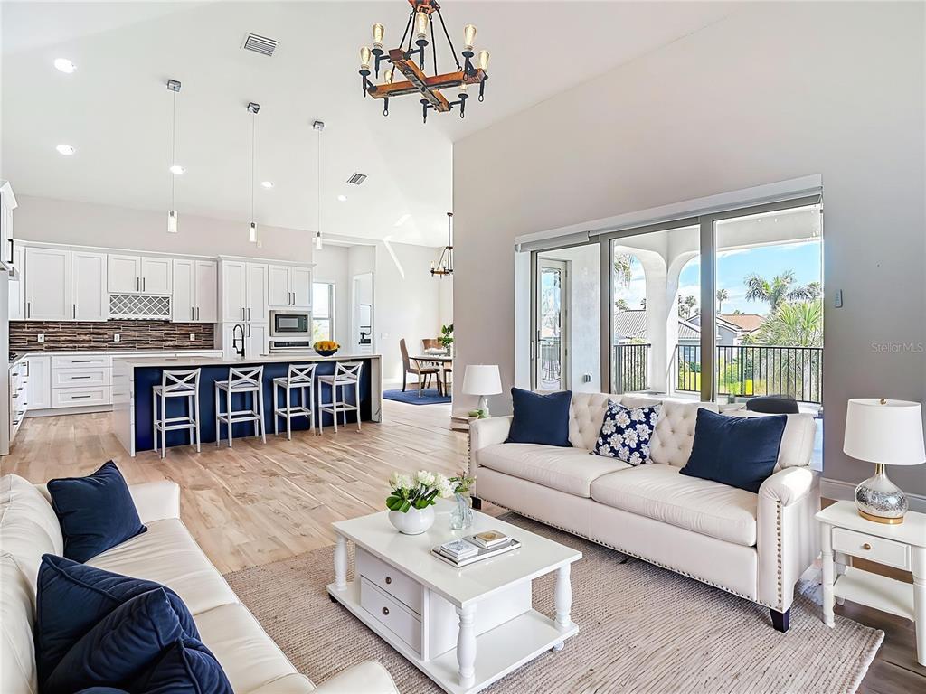 1329 Jumana Loop Apollo Beach, FL 33572 - Photo 5 of 40 a living room with furniture and kitchen view