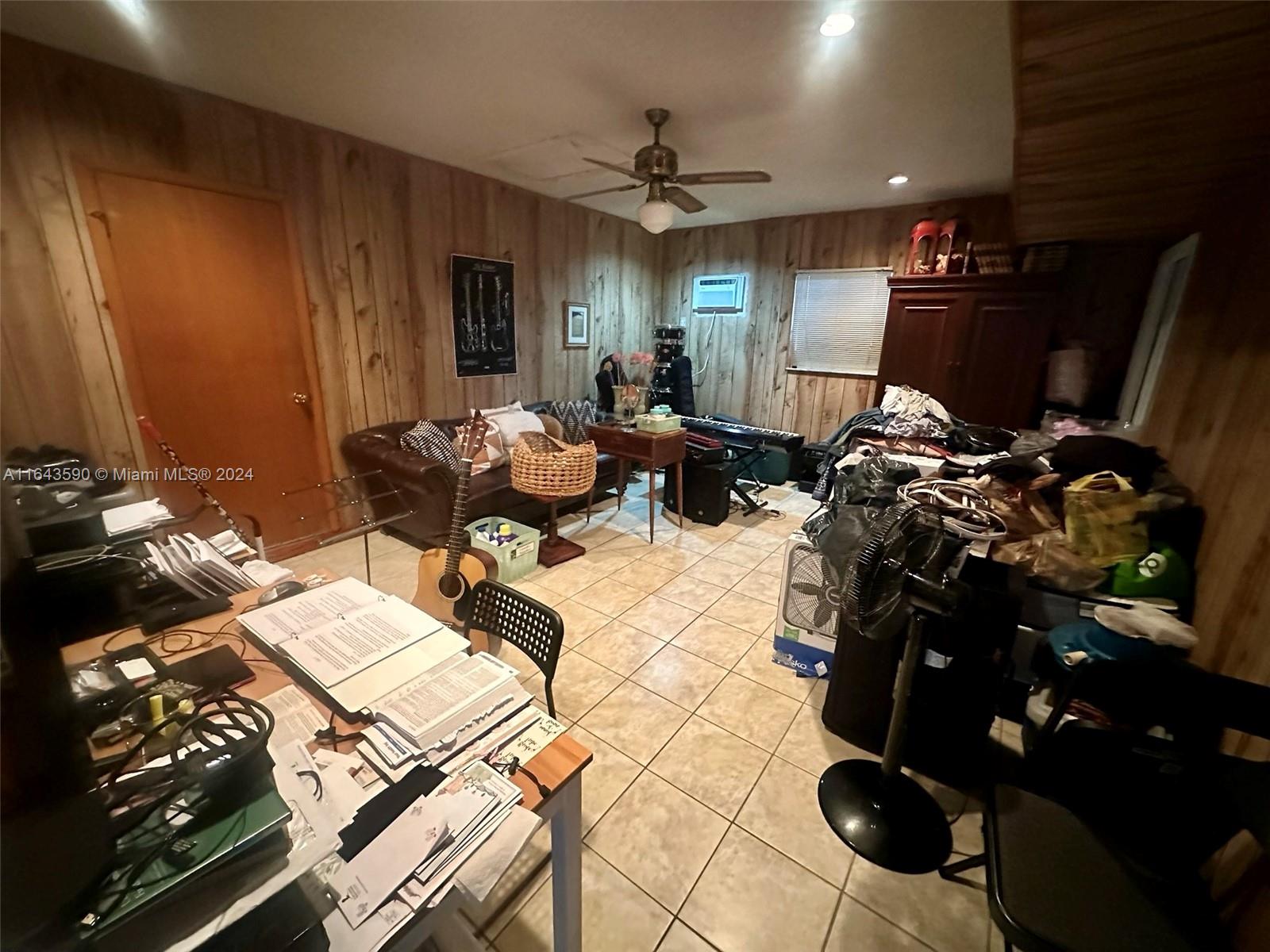 14200 Kendale Lakes Drive Miami, FL 33183 - Photo 17 of 21 a living room with furniture and a flat screen tv