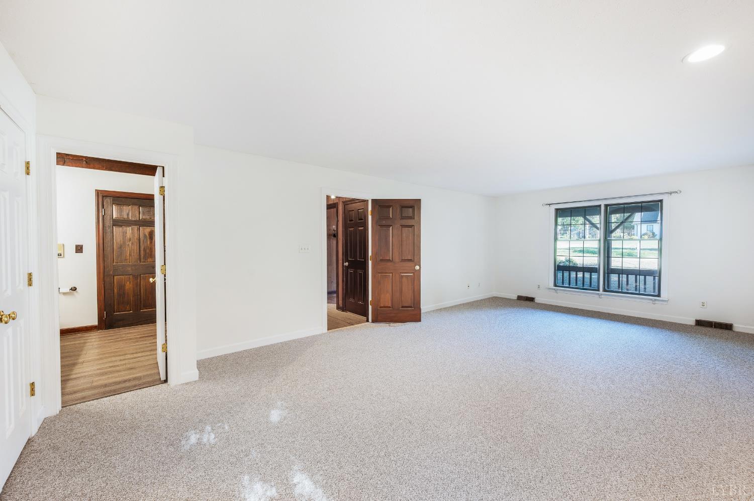 1139 Macon Loop Lynchburg, VA 24503 - Photo 25 of 63 an empty room with windows