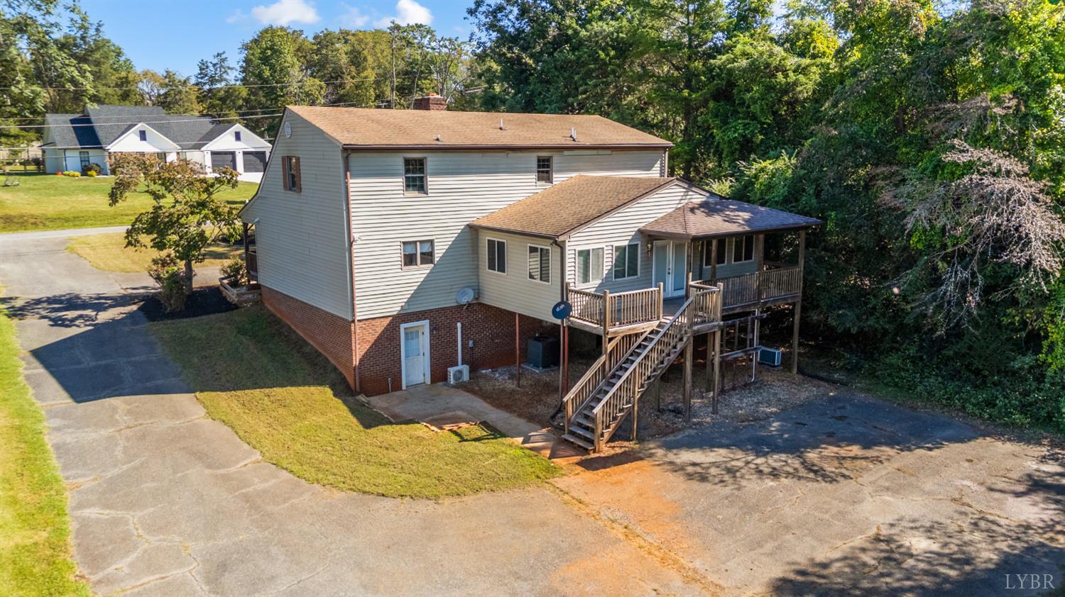 1139 Macon Loop Lynchburg, VA 24503 - Photo 4 of 63 an aerial view of a house with swimming pool and furniture
