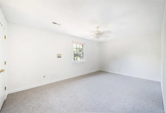 a bathroom with a shower and a bath tub